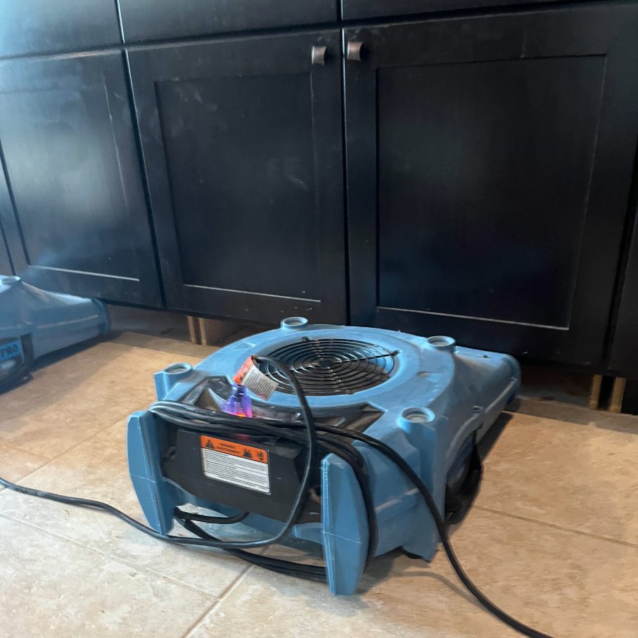 Image of water damage cleanup equipment in a kitchen